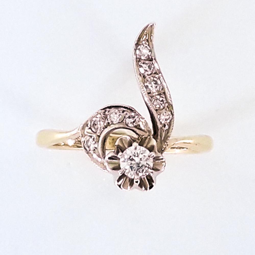 Золота каблучка з діамантами Кюз 750 Проба