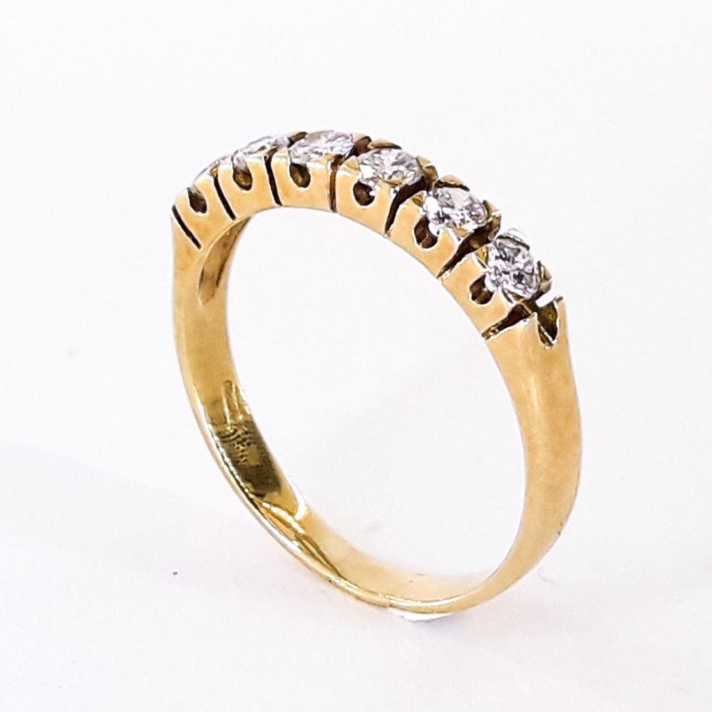 Золота каблучка з діамантами 750 проби доріжка