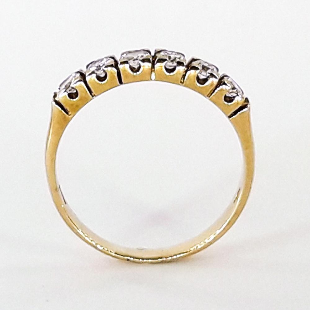 Золота каблучка з діамантами 750 проби доріжка