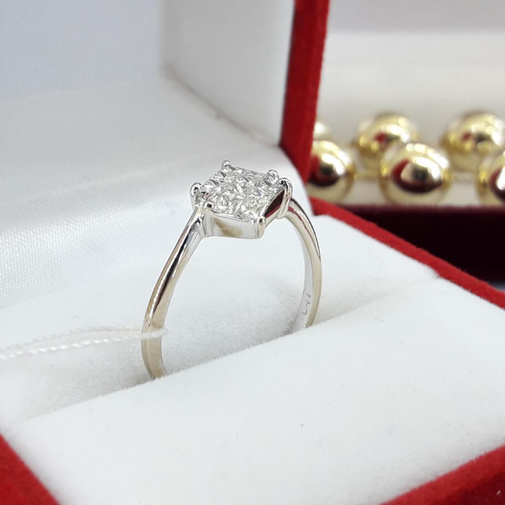 Золота каблучка з діамантами біле золото 750 проба