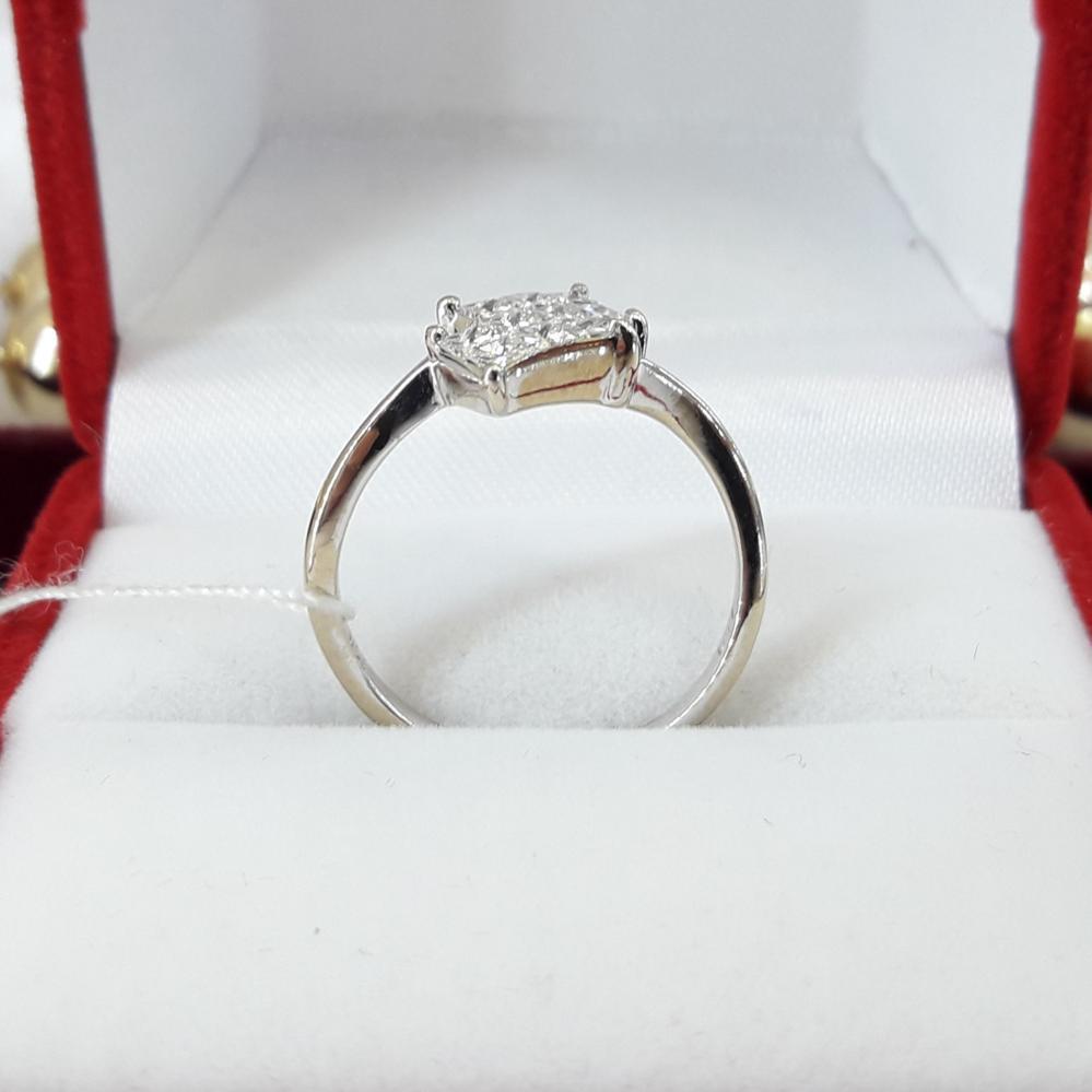 Золота каблучка з діамантами біле золото 750 проба