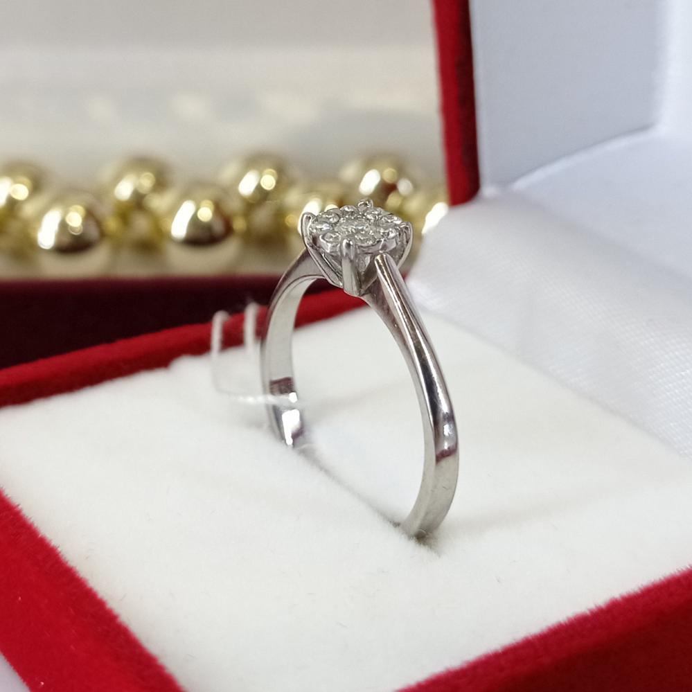 Золота каблучка з діамантами квітка