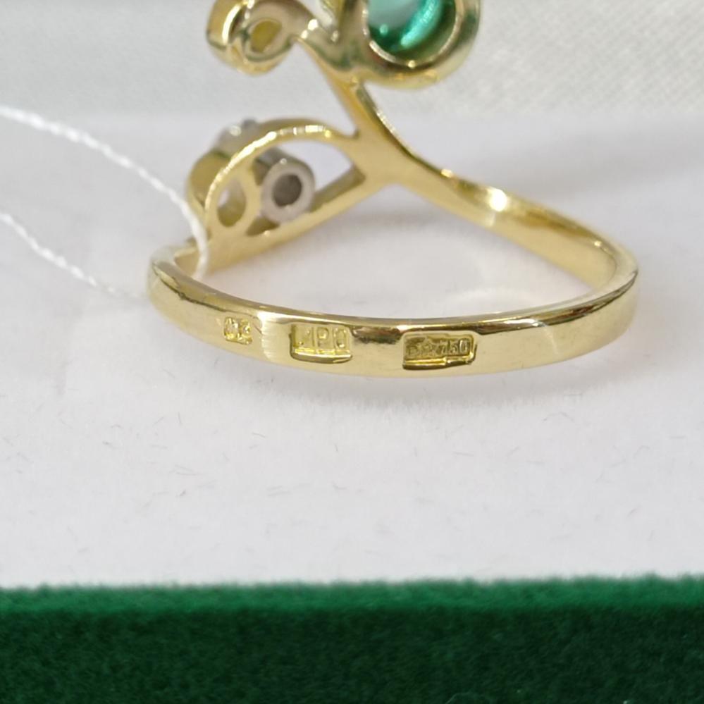 Золота каблучка з смарагдом та діамантом проба 750