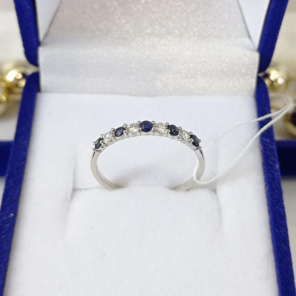 Золота каблучка доріжка с сапфірами та діамантами