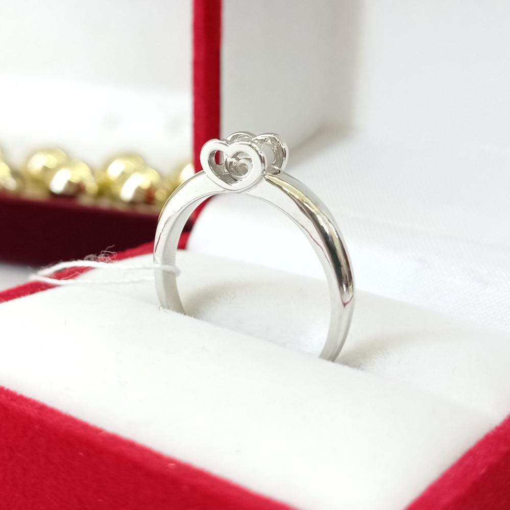 Золота каблучка з діамантом серце