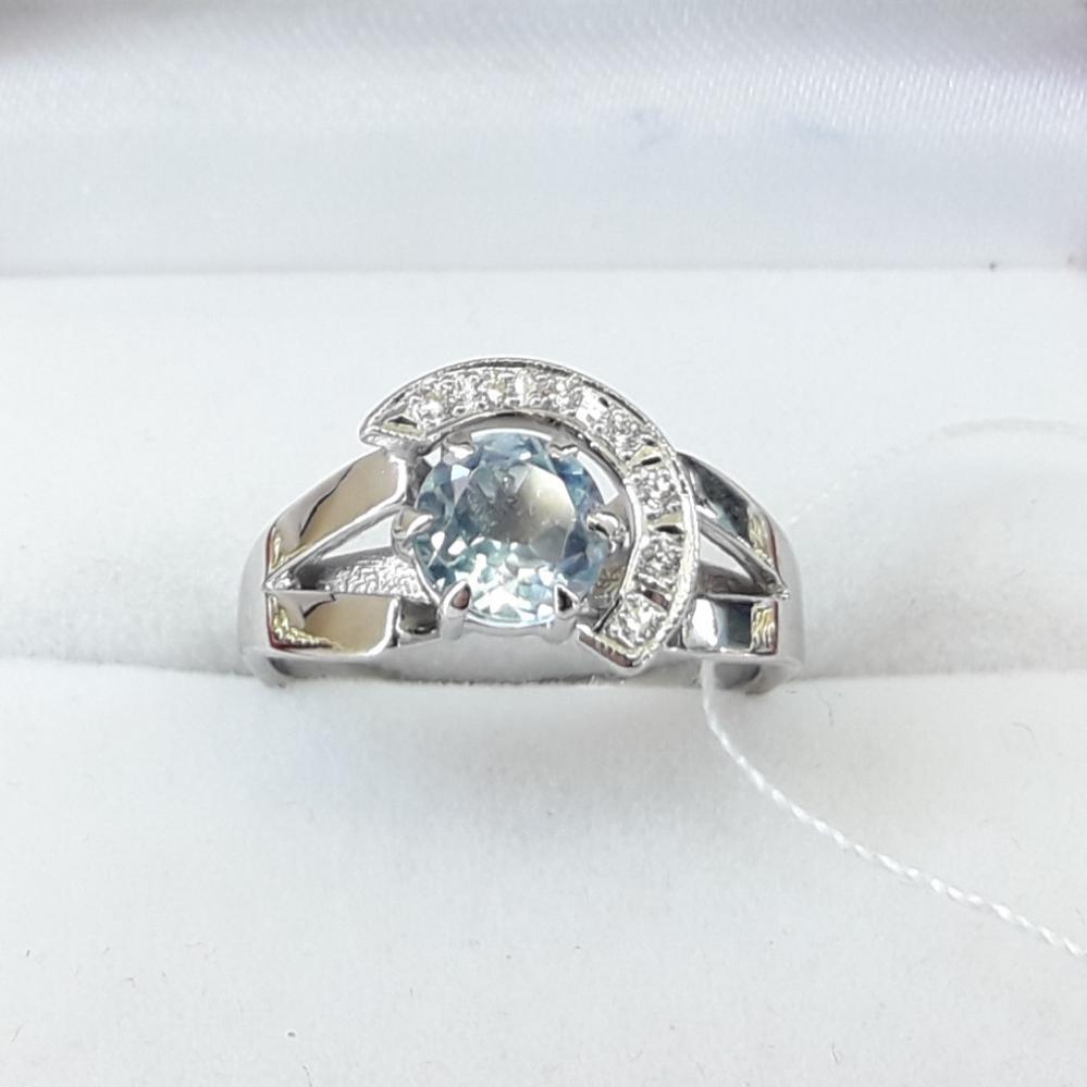 Золота каблучка з блакитним топазом і діамантами біле золото