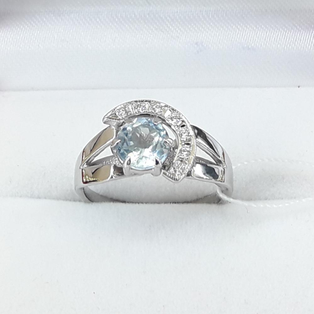 Золота каблучка з блакитним топазом і діамантами біле золото