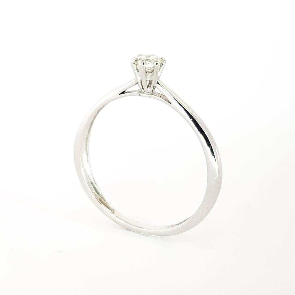 Каблучка золота з діамантом з білого золота