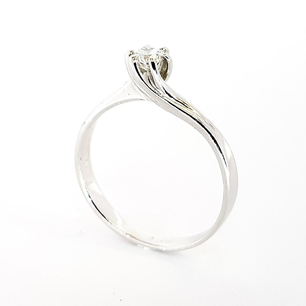 Золота каблучка з діамантом з білого золота