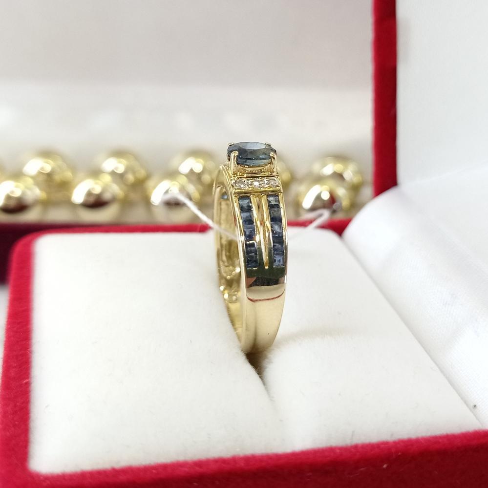 Золота каблучка з сапфірами та діамантами