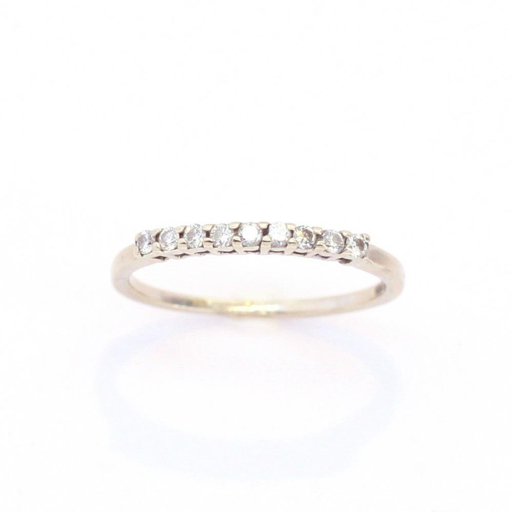 Золота каблучка доріжка з діамантами в білому золоті