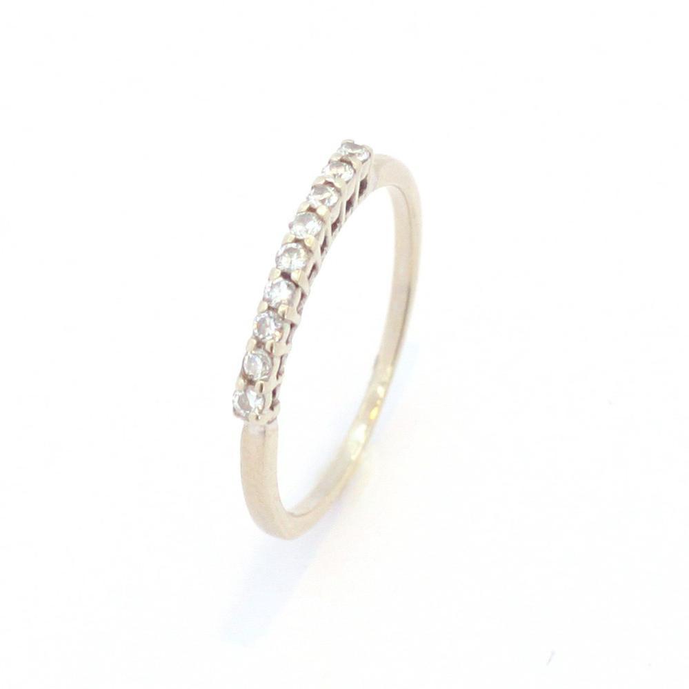 Золота каблучка доріжка з діамантами в білому золоті