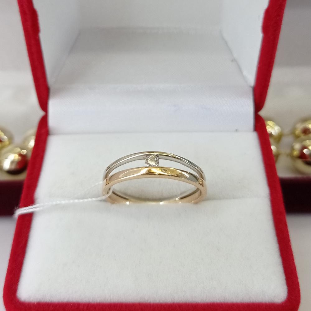 Золота каблучка з діамантом комбінована