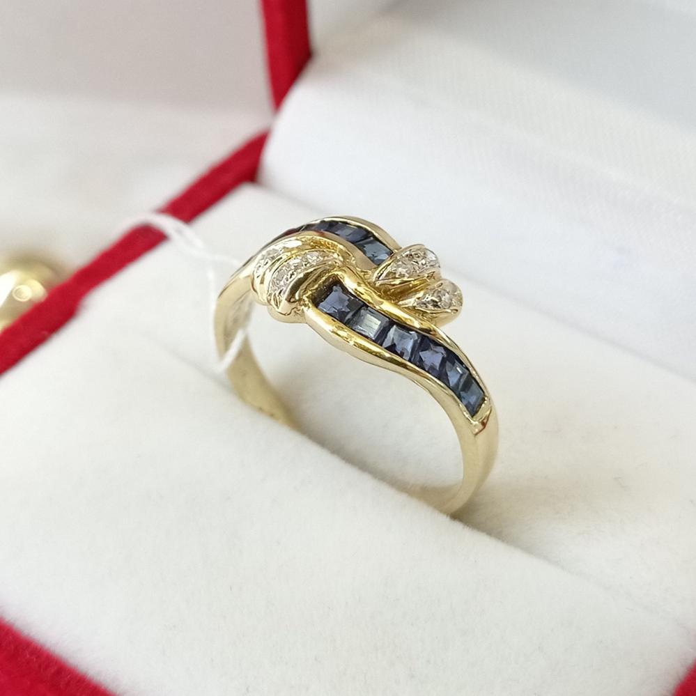 Золота каблучка з сапфірами та діамантами