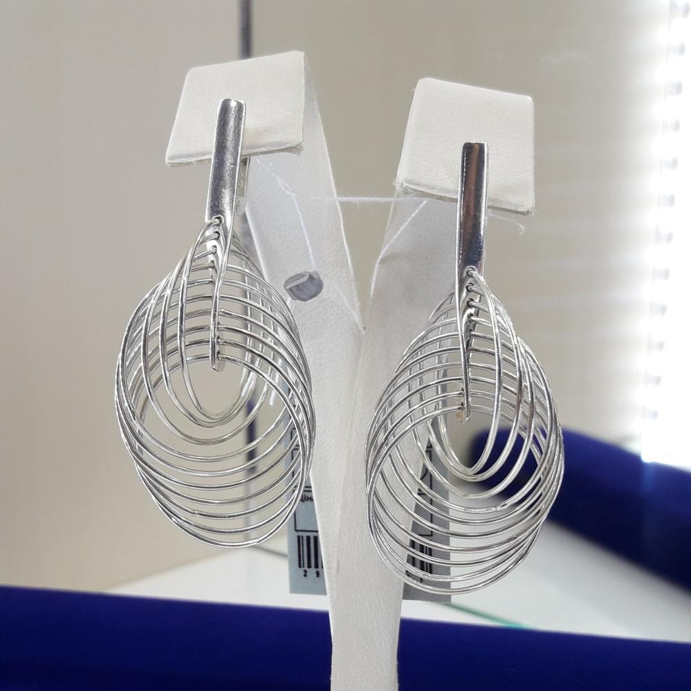 Срібні подовжені сережки кільцями англійської застібки