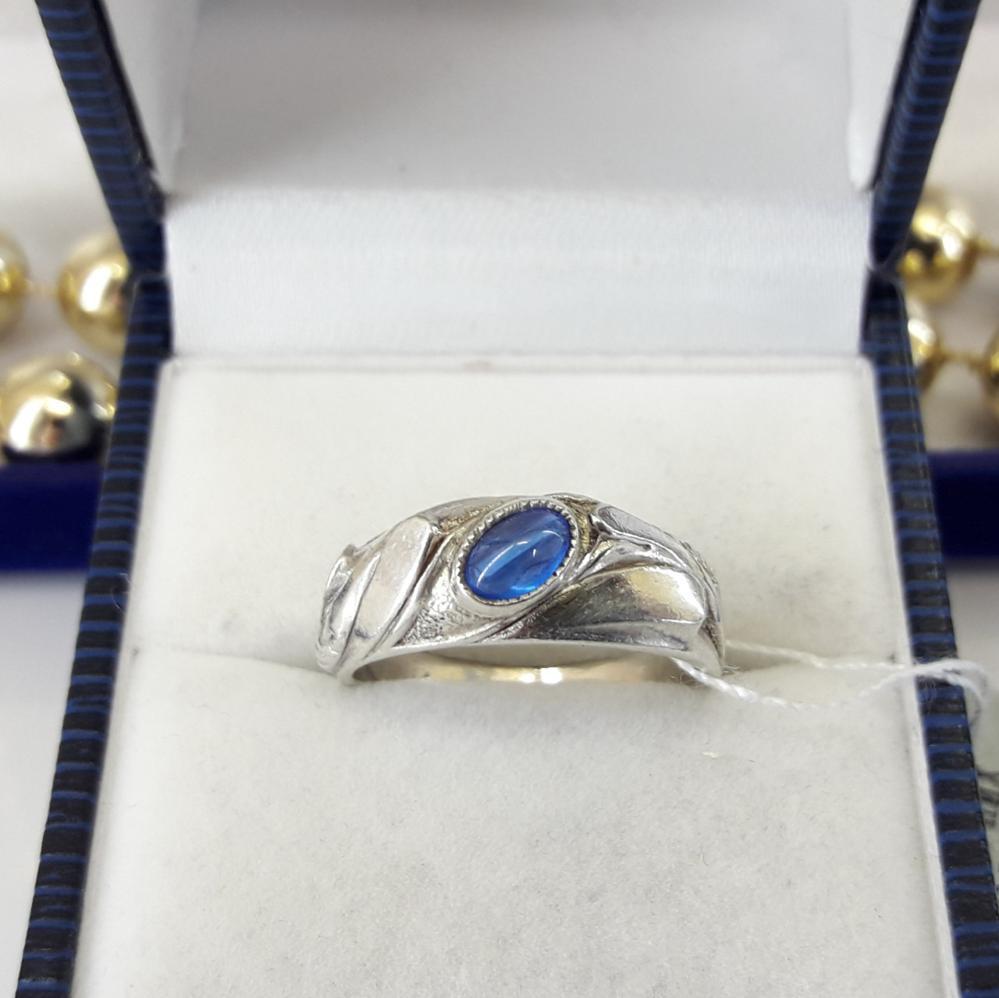 Срібне кільце з блакитним каменем